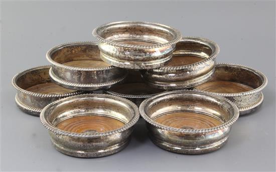 Two sets of four 19th century Sheffield plate wine coasters, diameter 13.3cm.